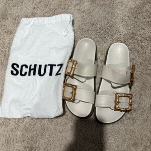 SCHUTZ Cream Slides with Gold Accents